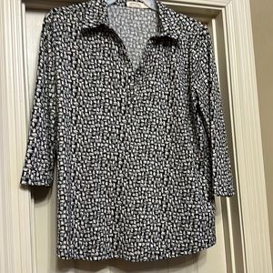 Women’s top made with polyester & spandex